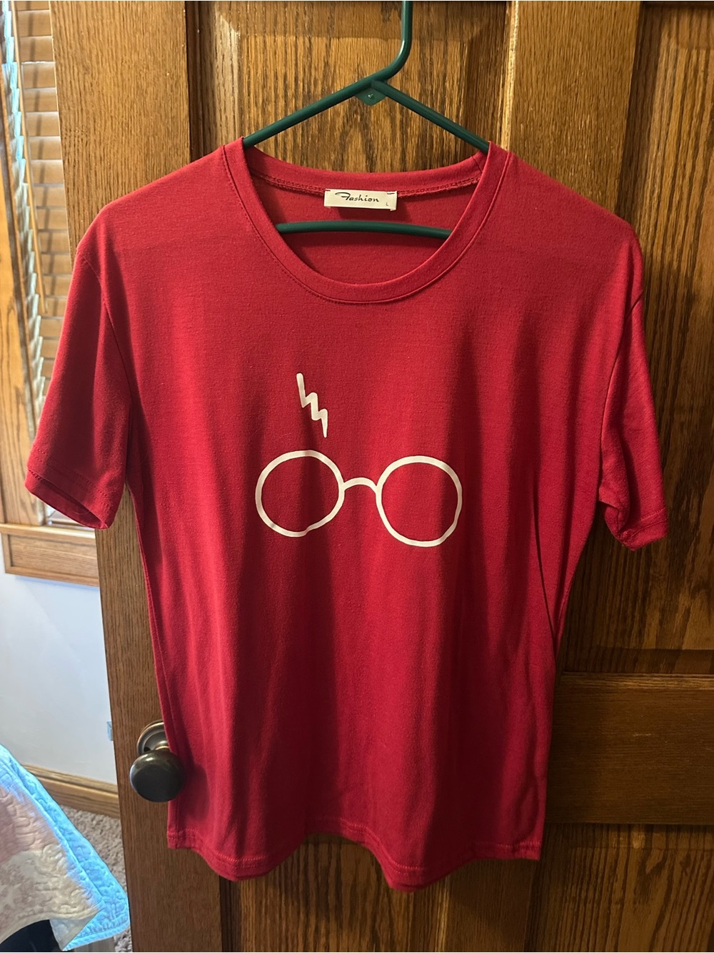 Red Graphic Tee with White Glasses Motif